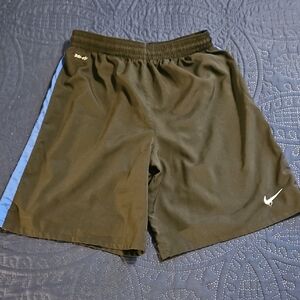 Nike Men's Black Shorts with Blue Stripe